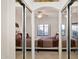 Bright and inviting bedroom featuring sliding mirror closet doors at 10401 N Saguaro Blvd # 130, Fountain Hills, AZ 85268