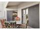 Relaxing patio area with stylish outdoor furniture and sliding door access at 10401 N Saguaro Blvd # 130, Fountain Hills, AZ 85268
