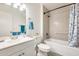 Bathroom with a shower and tub combination, complemented by a single sink vanity at 10909 W Santa Fe Dr, Sun City, AZ 85351