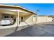 Exterior featuring a single carport with a house number, offering covered parking at 10909 W Santa Fe Dr, Sun City, AZ 85351