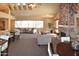 Relaxing clubhouse features fireplace, comfortable seating and large windows for natural light at 14145 N 92Nd St # 1031, Scottsdale, AZ 85260