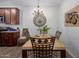 Inviting dining area featuring a chandelier, elegant decor, and seating for four guests at 14145 N 92Nd St # 1031, Scottsdale, AZ 85260
