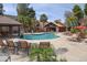 Relaxing outdoor pool area with comfortable lounge chairs and inviting umbrellas for shade on a sunny day at 14145 N 92Nd St # 1031, Scottsdale, AZ 85260