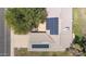 Top-down aerial view of a roof with solar panels, illustrating an eco-friendly energy solution for the home at 14633 N Boswell Blvd, Sun City, AZ 85351
