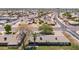 Aerial view of a quiet neighborhood, highlighting mature trees, well-kept lawns, and a serene residential environment at 14633 N Boswell Blvd, Sun City, AZ 85351