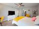 Well-lit bedroom showcasing modern decor, ceiling fan, and a comfortable atmosphere at 14633 N Boswell Blvd, Sun City, AZ 85351