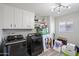 Well-lit laundry room equipped with modern appliances and ample storage, enhancing convenience and functionality at 14633 N Boswell Blvd, Sun City, AZ 85351