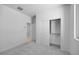 Neutral bedroom with a closet featuring sliding doors at 14777 W Soft Wind Dr, Surprise, AZ 85387