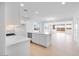 Modern kitchen with an island, stainless steel appliances, and white cabinetry at 14777 W Soft Wind Dr, Surprise, AZ 85387