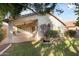 Beautiful backyard featuring a covered patio and well-maintained landscaping at 15911 W Carmen Dr, Surprise, AZ 85374