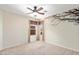Bright bedroom with ceiling fan and neutral tones, ready for personalization and comfort at 15911 W Carmen Dr, Surprise, AZ 85374