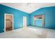 Primary bedroom with walk-in closet and ensuite bathroom at 15911 W Carmen Dr, Surprise, AZ 85374