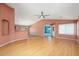 Spacious living room with high ceilings, and wood floors, great for entertaining at 15911 W Carmen Dr, Surprise, AZ 85374