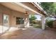 Covered patio area with a ceiling fan, great for enjoying the outdoors in comfort and style at 15911 W Carmen Dr, Surprise, AZ 85374