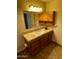 Bathroom vanity with cabinet storage and counterspace enhances functionality and style at 16423 N 41St Pl, Phoenix, AZ 85032