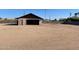 Detached garage with an oversized parking area at 16423 N 41St Pl, Phoenix, AZ 85032