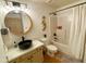 Updated bathroom with sleek fixtures, modern lighting, a stylish sink, and a shower-tub combo at 16545 E Gunsight Dr # 103, Fountain Hills, AZ 85268