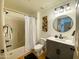 Contemporary bathroom features a vanity, stylish mirror, and bathtub with shower at 16545 E Gunsight Dr # 103, Fountain Hills, AZ 85268