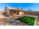 Private backyard featuring an extended patio, artificial turf, and block fencing at 1841 E Kings Ave, Phoenix, AZ 85022