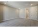 Neutral bedroom featuring plush carpeting and an open doorway to the ensuite bathroom at 2121 W Sonoran Desert Dr # 45, Phoenix, AZ 85085