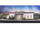 Contemporary building featuring a stone entrance and clean, white facade, set against a vibrant sunset sky at 2121 W Sonoran Desert Dr # 45, Phoenix, AZ 85085