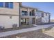 Contemporary home with multiple balconies, modern stone accents, and manicured landscaping offering curb appeal at 2121 W Sonoran Desert Dr # 45, Phoenix, AZ 85085