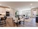 Open-concept living space with hardwood floors, modern furniture, and plenty of natural light at 2121 W Sonoran Desert Dr # 45, Phoenix, AZ 85085