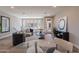 Upstairs living area with contemporary furniture, hardwood floors, and abundant natural light at 2121 W Sonoran Desert Dr # 45, Phoenix, AZ 85085