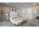 Relaxing main bedroom featuring neutral paint, carpet, modern furniture and ensuite bathroom at 2121 W Sonoran Desert Dr # 45, Phoenix, AZ 85085