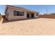 View of home from the backyard, showing the covered patio and ample space at 21640 E Roundup Way, Queen Creek, AZ 85142