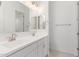 Bright bathroom featuring a double sink vanity and modern fixtures and ample lighting at 21640 E Roundup Way, Queen Creek, AZ 85142