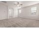 Spacious bedroom features a ceiling fan, and an ensuite bathroom at 2235 W Park St, Phoenix, AZ 85041