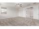 Large bedroom features an ensuite bathroom and bright windows at 2235 W Park St, Phoenix, AZ 85041