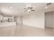 Bright living room showcasing tile flooring, recessed lighting, and an open-concept layout at 2235 W Park St, Phoenix, AZ 85041