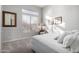 Bright bedroom featuring a large window and comfortable bed, perfect for relaxation at 2415 W Hazelhurst Ct, Anthem, AZ 85086