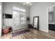 Bright bonus room with a yoga mat, mirror, and modern fixtures at 2415 W Hazelhurst Ct, Anthem, AZ 85086