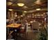 Restaurant with tables, chairs, bar area, and hanging pendant lights at 2415 W Hazelhurst Ct, Anthem, AZ 85086