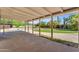 Spacious covered patio overlooking a putting green, perfect for entertaining and outdoor enjoyment at 2425 E Harvard St, Phoenix, AZ 85008