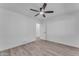 A bright bedroom showcases wood floors and bright lighting at 2425 E Harvard St, Phoenix, AZ 85008