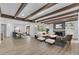 Living room with dining area and wood beam ceilings at 2425 E Harvard St, Phoenix, AZ 85008