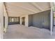 Covered patio with concrete floor, brick walls, and plenty of space for outdoor seating and entertaining at 2425 E Harvard St, Phoenix, AZ 85008