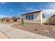 View of stylish homes and attractive landscaping at 25215 N 131St Dr, Peoria, AZ 85383