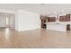 Unfurnished living space showcasing open layout and modern tile flooring, perfect for customization at 25215 N 131St Dr, Peoria, AZ 85383