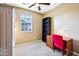 Neutral bedroom with carpet flooring, ceiling fan, work station and natural light at 2727 S Equestrian Dr # 103, Gilbert, AZ 85295