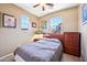 Bedroom with carpet flooring, ceiling fan, natural light and dresser storage at 2727 S Equestrian Dr # 103, Gilbert, AZ 85295