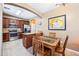 Modern kitchen with stainless steel appliances, granite countertops, and an adjacent dining area, ideal for entertaining at 2727 S Equestrian Dr # 103, Gilbert, AZ 85295