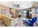 Inviting living room showcasing a modern design, comfortable seating, and an entertainment center for relaxing evenings at 2727 S Equestrian Dr # 103, Gilbert, AZ 85295