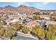 Beautiful aerial view of home featuring solar panels and desert landscape at 2957 N Riley Ct, Buckeye, AZ 85396