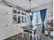 Dining area with built-in cabinets and drawers at 2957 N Riley Ct, Buckeye, AZ 85396