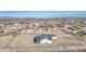Expansive aerial view of a new home with generous surrounding land in a developing residential area at 30634 W Latham St, Buckeye, AZ 85326